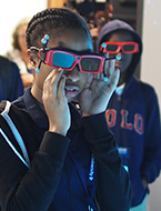 Students participate in a virtual reality (VR) exploration of the Red Planet (Mars) at NYLF Explore STEM Alumni