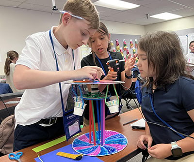 Students participate in a STEM challenge at NYLF Pathways to STEM