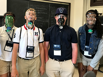 Students wear the breathing apparatuses they worked on during NYLF Explore STEM Alumni's multi-day simulation
