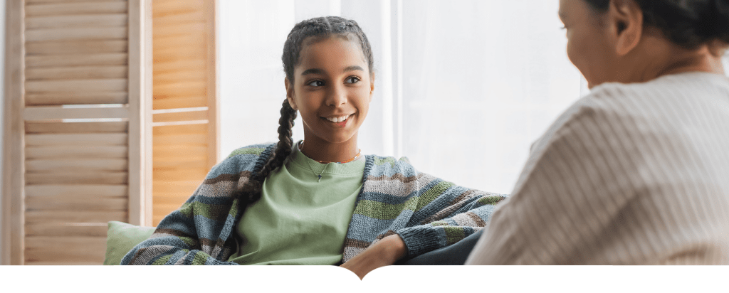 Daughter talking with Mom on couch