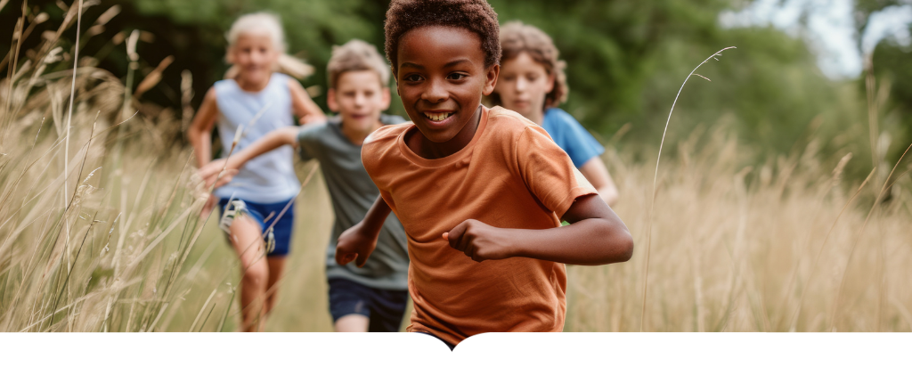 Kids running through a field