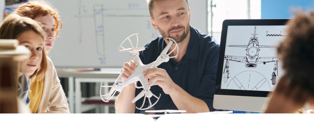 Student working on a drone