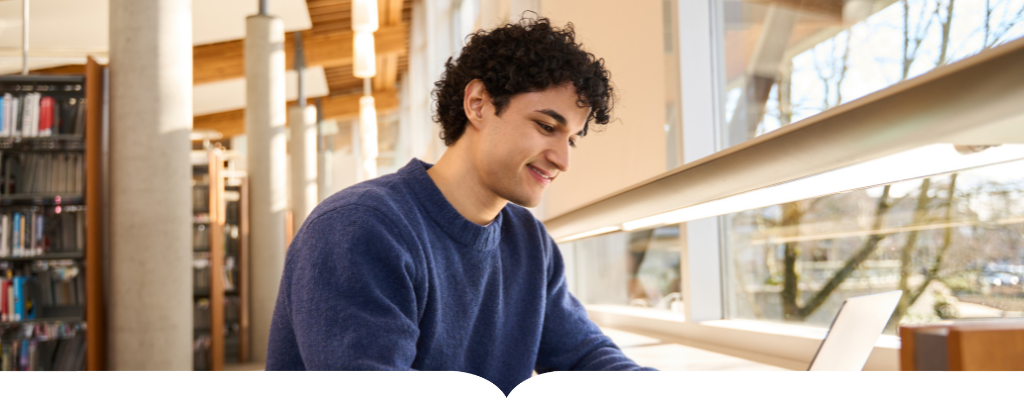 Student studying in a library